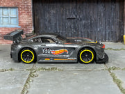 Hot Wheels '16 Mercedes-AMG GT3 metallic dark gray number 68, right side view