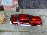 Hot Wheels 1988 Ford T-Bird red Vetuskey Motor Co. number 088 loose car, top view