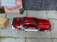 Hot Wheels 1988 Ford T-Bird red Vetuskey Motor Co. number 088 loose car, top view