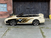 Hot Wheels 1996 Mustang GT pearl white with black and gold flames loose car, left side view