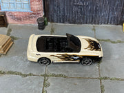 Hot Wheels 1996 Mustang GT pearl white with black and gold flames loose car, top view