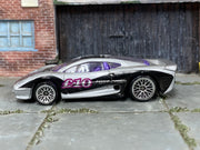 Hot Wheels 1998 Jaguar XJ220 Fast Cash left-side view