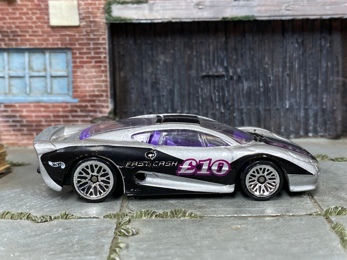 Hot Wheels 1998 Jaguar XJ220 Fast Cash right-side view