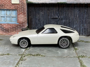 Hot Wheels 1998 Porsche 928 pearl white right-side view