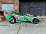 1999 Hot Wheels McDonald's Trail Runner lime green loose car, left-side view