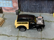 2001 Hot Wheels Morris Wagon black and tan First Edition 28759 loose car, top view