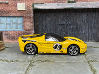 Hot Wheels 2002 40 Somethin yellow left-side view
