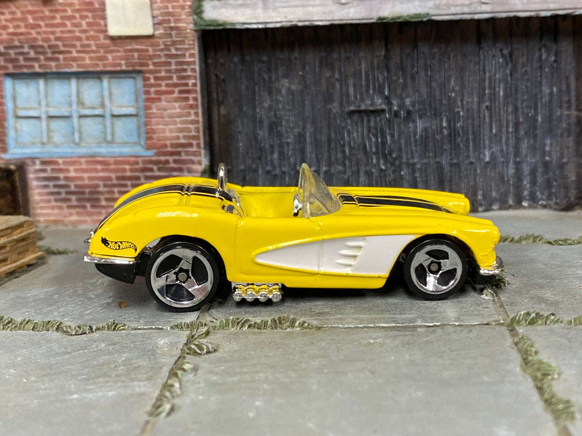 2002 Hot Wheels '58 Corvette yellow 54339 loose car, right-side view