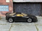 Hot Wheels 2002 Lotus Esprit black left-side view