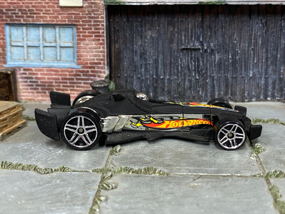 2004 Hot Wheels F-Racer matte black B3531 First Editions loose car, right-side view