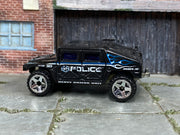 2005 Hot Wheels Humvee Roll Patrol H9056 loose truck, left-side view