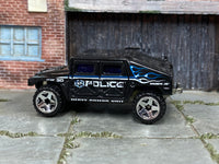2005 Hot Wheels Humvee Roll Patrol H9056 loose truck, left-side view