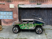 2006 Hot Wheels Humvee chrome with green flames J3393 loose truck, left-side view