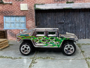 2006 Hot Wheels Humvee chrome with green flames J3393 loose truck, right-side view