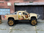 Hot Wheels 2010 Sandblaster tan camouflage left-side view