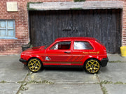 Hot Wheels 2014 Volkswagen Golf Holiday Hot Rods red left-side view
