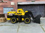 2014 Hot Wheels Wheel Loader yellow BFC33 loose construction vehicle, right-side view