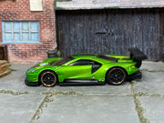 Hot Wheels 2016 Ford GT Race metallic green number 17 loose car, left side view