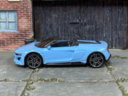 Hot Wheels 2019 Audi R8 Spyder in light blue — left side view