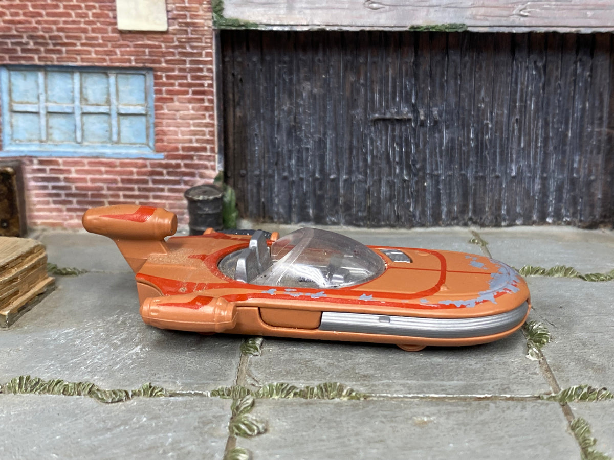 Hot Wheels 2021 Star Wars X-34 Landspeeder copper right-side view