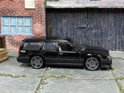 Hot Wheels 2022 Volvo 850 Estate black left-side view