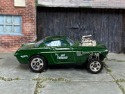 Hot Wheels 2023 Volvo P1800 Gasser forest green left-side view