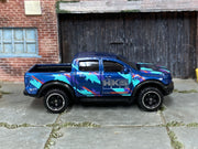 2024 Hot Wheels '19 Ford Ranger Raptor dark blue HKS loose truck, right-side view