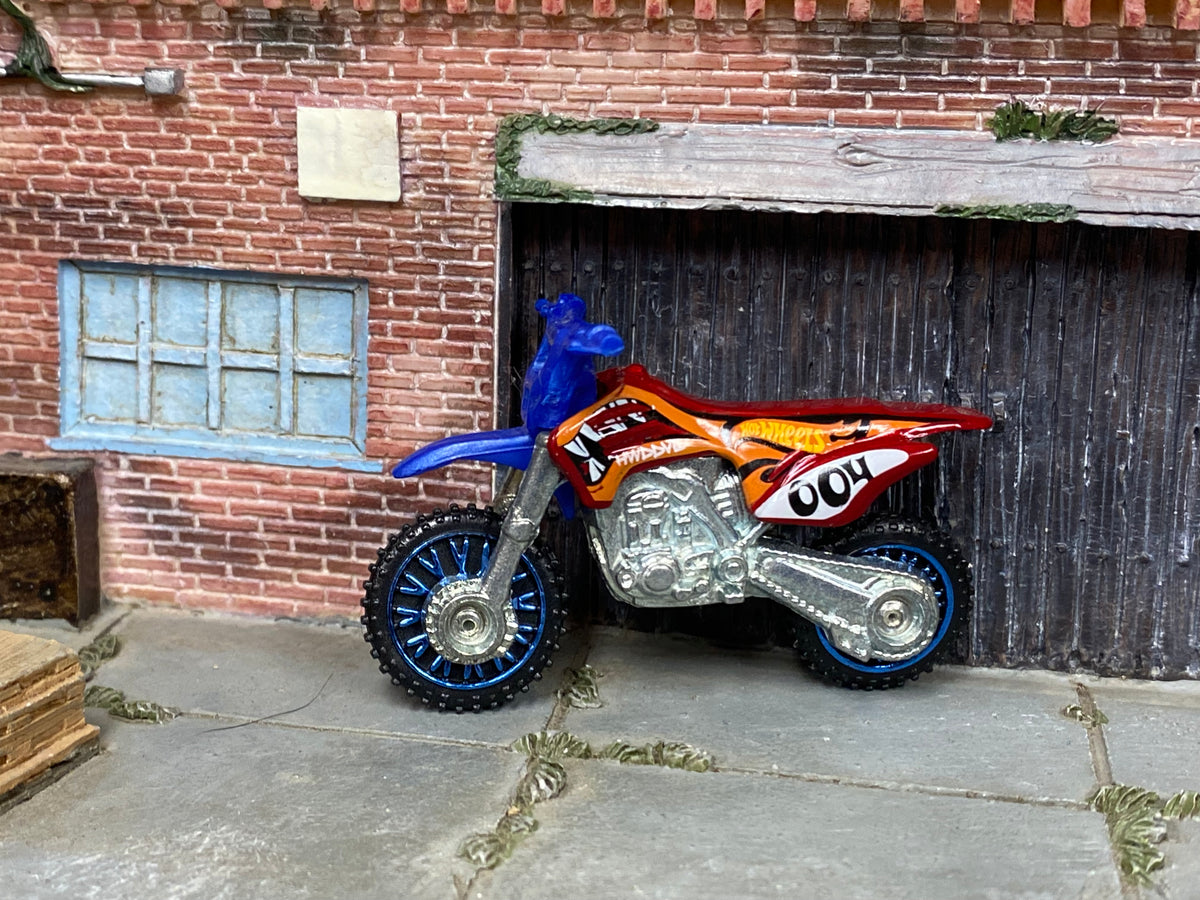 Hot Wheels 2024 HW450F red and blue right-side view