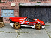 Hot Wheels 2024 Rally Speciale red left-side view