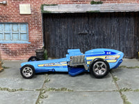 Hot Wheels 2024 Rockin' Railer light blue left-side view
