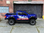 2025 Hot Wheels '17 Ford F-150 Raptor metalflake blue number 17 loose truck, right-side view