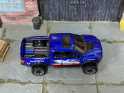 2025 Hot Wheels '17 Ford F-150 Raptor metalflake blue number 17 loose truck, top view