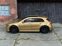 2025 Hot Wheels '19 Mercedes-Benz A-Class metalflake gold H7045 loose car, left-side view