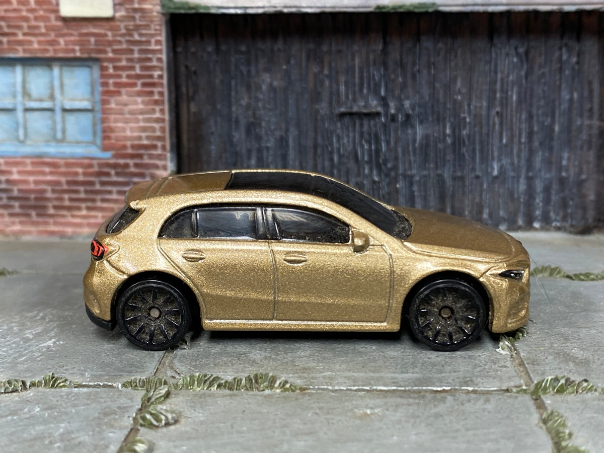 2025 Hot Wheels '19 Mercedes-Benz A-Class metalflake gold H7045 loose car, right-side view