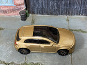 2025 Hot Wheels '19 Mercedes-Benz A-Class metalflake gold H7045 loose car, top view