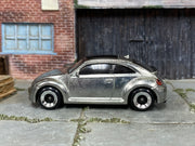 2025 Hot Wheels 2012 Volkswagen Beetle ZAMAC loose car, left-side view