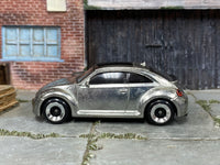 2025 Hot Wheels 2012 Volkswagen Beetle ZAMAC loose car, left-side view