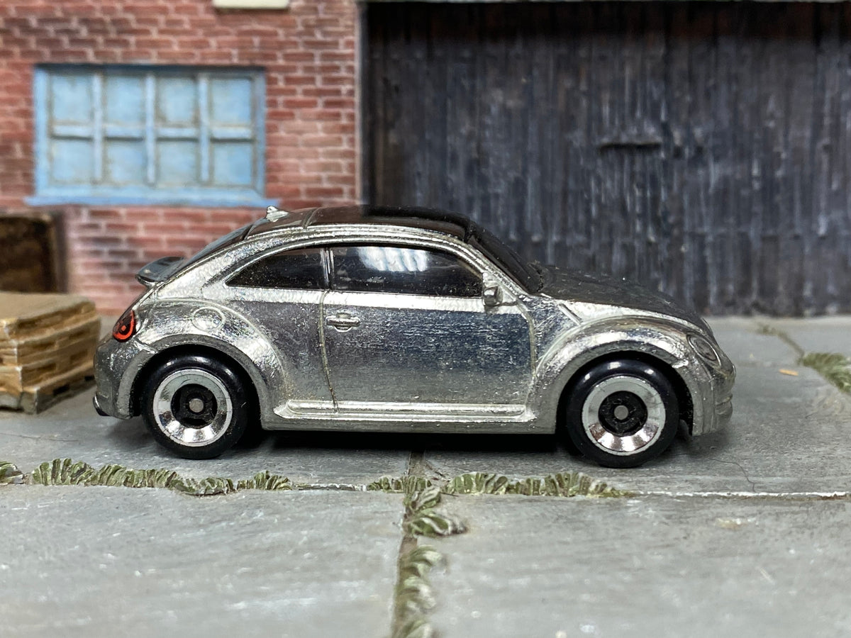 2025 Hot Wheels 2012 Volkswagen Beetle ZAMAC loose car, right-side view