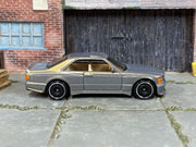 Hot Wheels 2025 '89 Mercedes-Benz 560 SEC AMG pearl slate gray left-side view