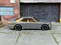 Hot Wheels 2025 '89 Mercedes-Benz 560 SEC AMG pearl slate gray left-side view