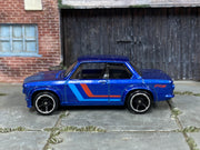 2025 Hot Wheels BMW 2002 metalflake blue JBB61 loose car, left-side view