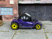 Hot Wheels 2025 Decidedly Go purple left-side view