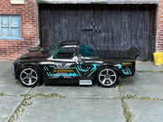 2025 Hot Wheels Draftnator transparent black HYX67 loose truck, left-side view