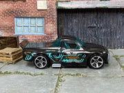 2025 Hot Wheels Draftnator transparent black HYX67 loose truck, right-side view
