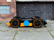 2025 Hot Wheels Flippin Fast black and orange HYY58 loose car, right-side view