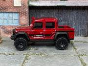 2025 Hot Wheels '15 Land Rover Defender Double Cab red Yokohama loose truck, left-side view
