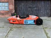 2025 Hot Wheels Morgan Super 3 salmon HYX48 loose car, right-side view