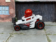 2025 Hot Wheels Skull Shaker white and red JBB73 loose car, left-side view