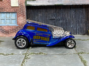 Hot Wheels 2025 Straight Pipes blue Keep Stage left-side view