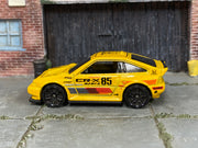 2026 Hot Wheels 1985 Honda CR-X yellow JJJ51 loose car, left-side view